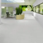 Vinílico Magma Acoustic (3mm) recepción Centro Médico, OMV